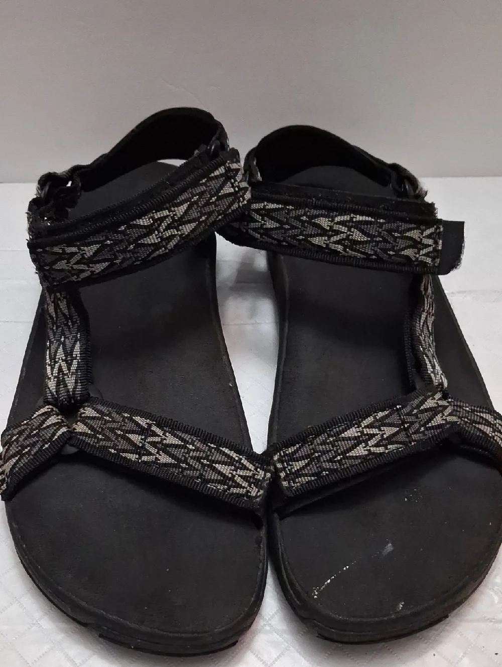 Teva Size 10 men's sandal in black, gray strap with velcro adjustable strap.